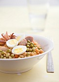 Rice with squid, sausage and hard-boiled egg