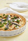 Sardine quiche with mushrooms and parsley