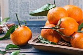 Clementines with leaves