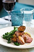Duck breast with figs and kale
