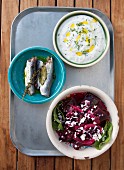 Greek mezze: fish, yoghurt and beetroot salad