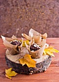 Autumnal chocolate muffins with flaked almonds