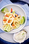 Spicy squid rings with aioli and limes