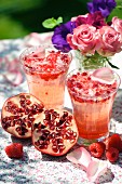 Rose and pomegranate drink with raspberry syrup