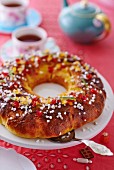 Couronne bordelaise with candid fruits and sugar nibs