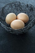 Eggs in a wire Easter nest