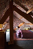 Attic bedroom with William Morris wallpaper