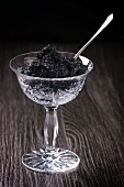 Black caviar in a crystal glass