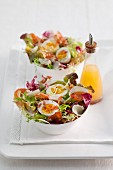 Mixed salad with bacon and egg