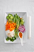 Oriental noodle salad with green asparagus and cucumber