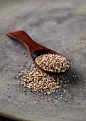 Colourful quinoa on a wooden spoon