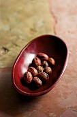 Nutmegs in a wooden bowl