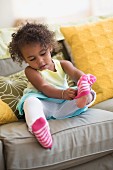 Little girl wearing pink socks
