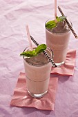 Chocolate shakes garnished with mint leaves