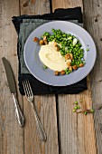 Mashed potatoes with buttered peas and diced tofu