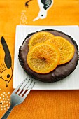 A chocolate tartlet with clementines