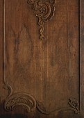 A carved wooden surface