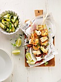 Seafood skewers with courgette salad