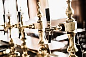 Old fashioned taps in the traditional pub Anno 1905 in Hamburg