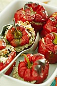 Peppers filled with rice and dates sprinkled with sesame seeds