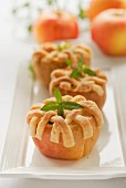 Baked apple topped with pastry strips