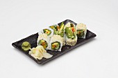 Maki with avocado and vegetables served with ginger and wasabi (Japan)