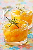 Peaches in white wine with rosemary