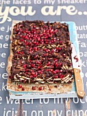 Chocolate cake made with biscuits and pomegranate seeds