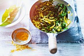 Stir-fried chard and cabbage medley with turmeric and ginger