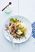Fish fillet with a radish and caper salsa and mashed potatoes