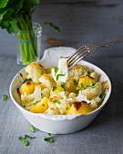 Cauliflower gratin with potatoes and fresh parsely