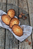 Hazelnut madeleines on a wire rack