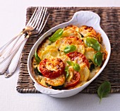 Courgette and potato bake with tomatoes and basil