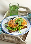 Salmon burgers with millet on pumpernickel