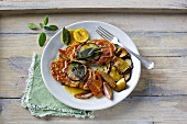 Saltimboca with an aubergine and shallot medley
