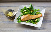 Oriental mange tout salad with oven-baked salmon