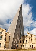 The military history museum in Dresden - an avant-garde wedge made from steel, concrete and glass slicing through the splendid neoclassical building