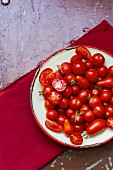 Various types of tomatoes on plate