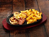 Chicken with bacon, cheese and chips