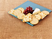 Crackers, Camembert cheese and grapes