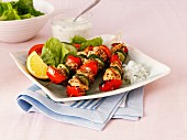 Greek chicken, pepper and courgette kebabs with salad