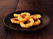 Fried onion rings on a plate