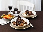 Oxtail and onion stew with carrots and mashed potatoes