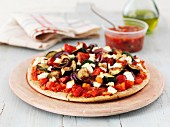 Mediterranean vegetable pizza with feta cheese and salsa