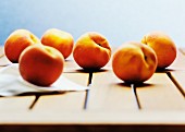 Peaches on a wooden table