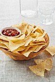 Salsa and tortilla chips in a basket