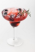 A Margarita with blackberries and rosemary