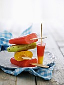 A stack of fruit ice lollies