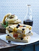 Focaccia stuffed with tomatoes and olives
