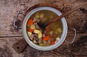 Vegetable soup with beef in a pot